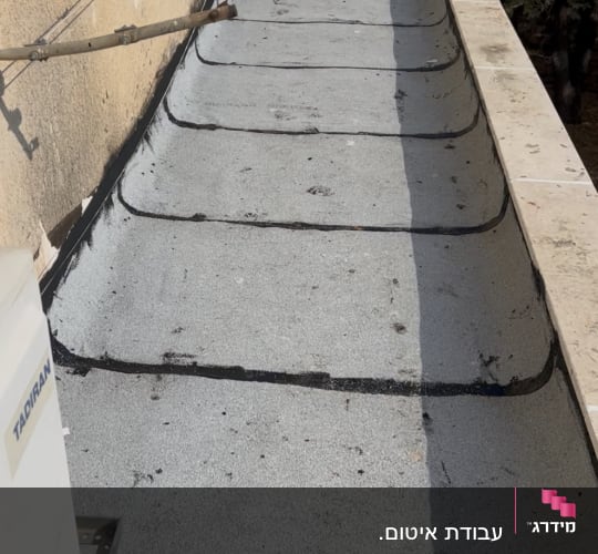 גג עם איטום ביטומני